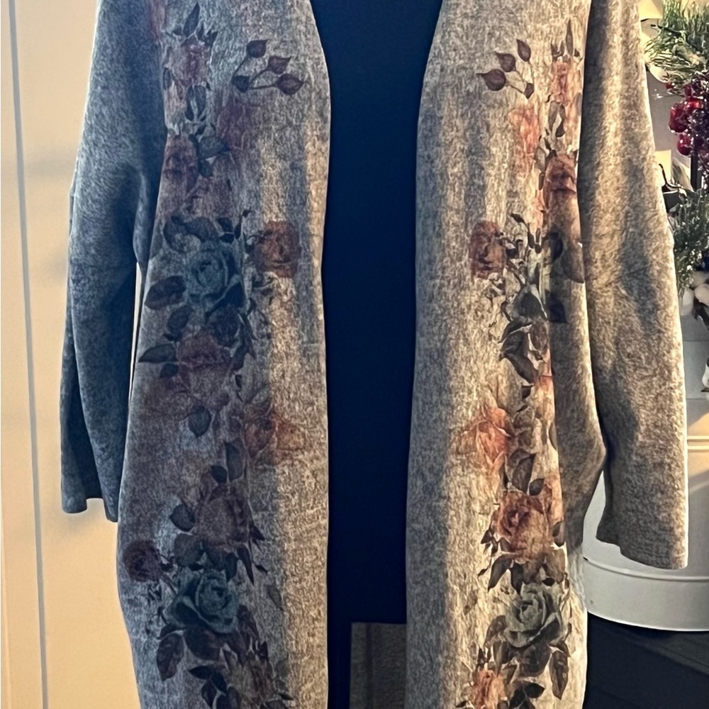 Sweater in size large with floral print and design 3/4 sleeve